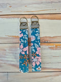 Blossoms on blue Fabric Wristlet